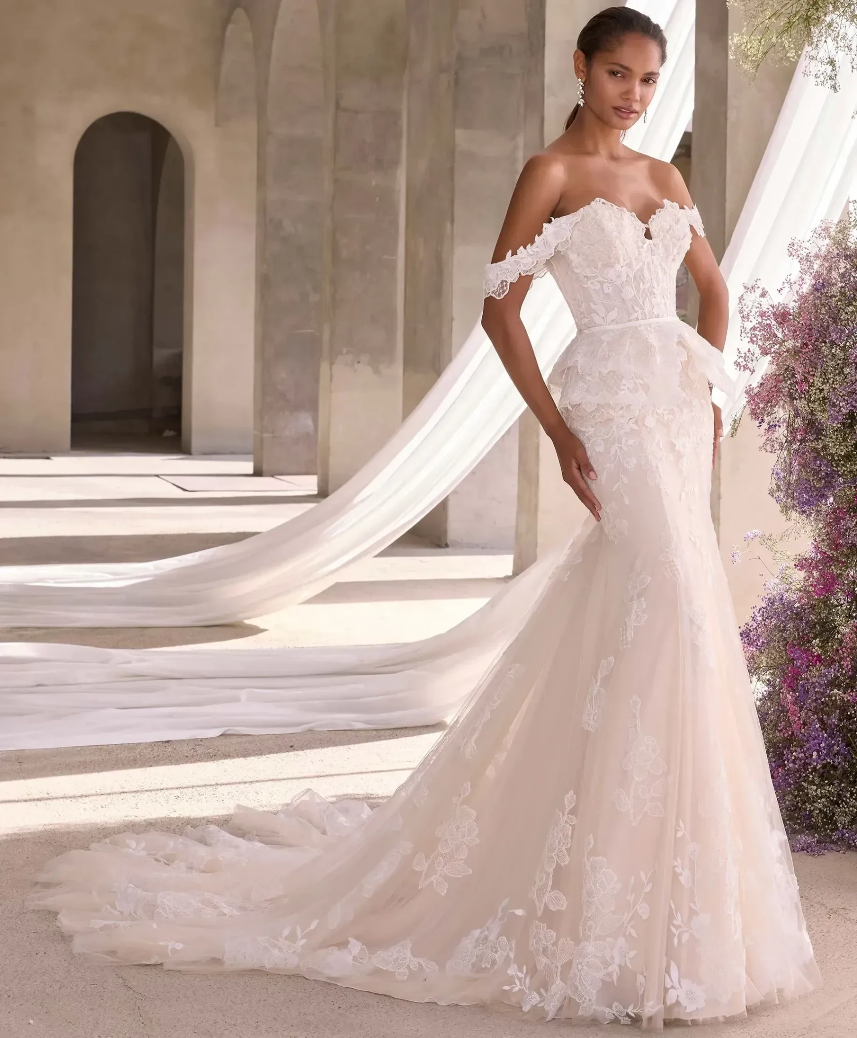 Model wearing a bridal white dress