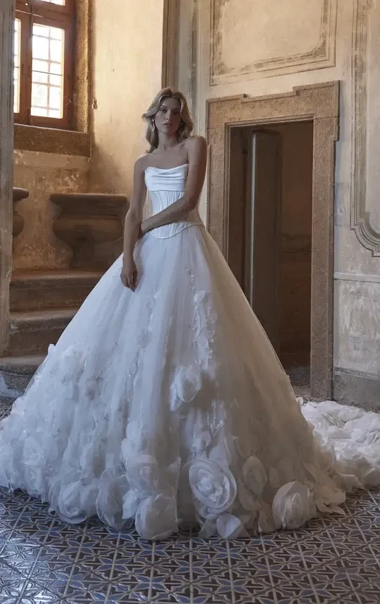 model is wearing a strapless bridal gown
